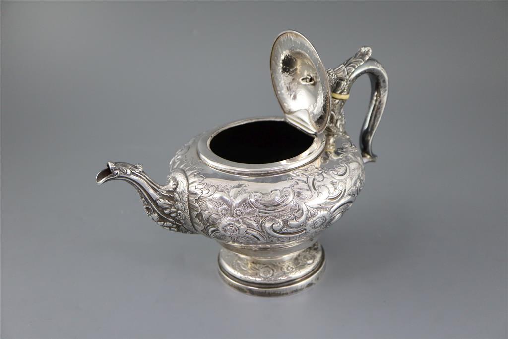 A George IV? silver pedestal teapot with thistle finial, marks rubbed,
